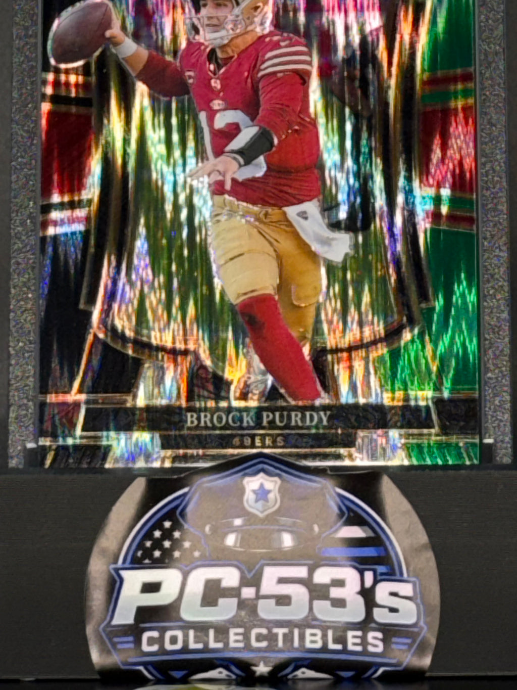 Panini 2025 Select Football Premier Level Black/Green Prizm Brock Purdy #117